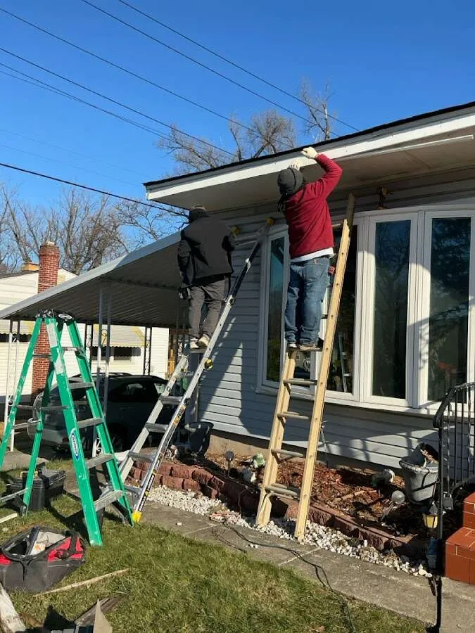 Restoration crew performing exterior repair in Volney